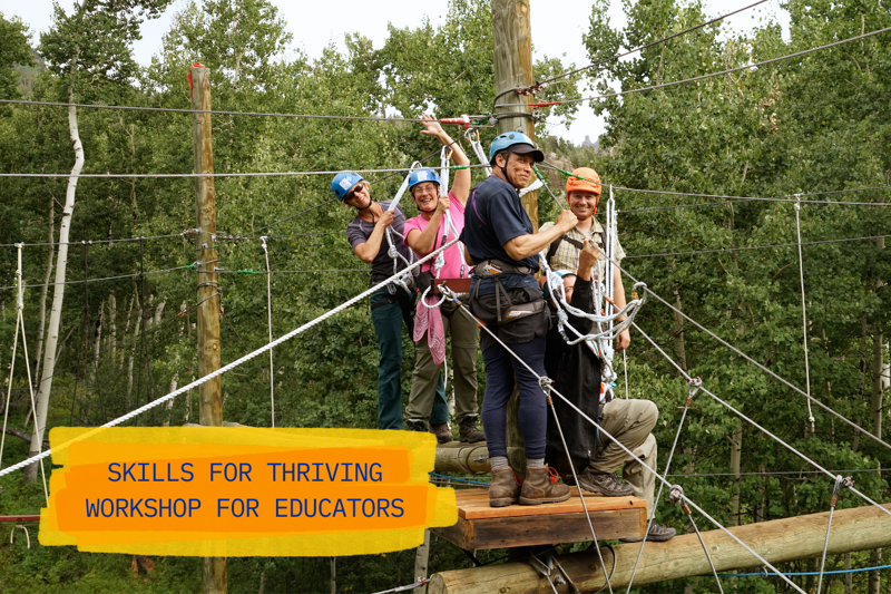 The image shows a group of four people on a ropes course, likely participating in a team-building or skills workshop. They are wearing helmets and harnesses, indicating safety precautions. The background features a lush green forest, suggesting an outdoor setting. A banner at the bottom reads "SKILLS FOR THRIVING WORKSHOP FOR EDUCATORS."